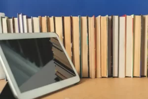 books-with-digital-device